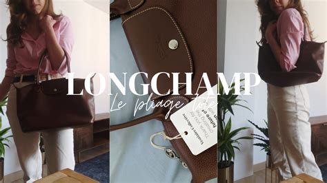 longchamp en espanol.